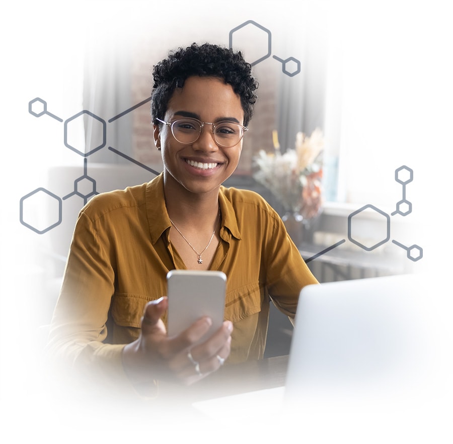 Smiling woman using interconnected technology