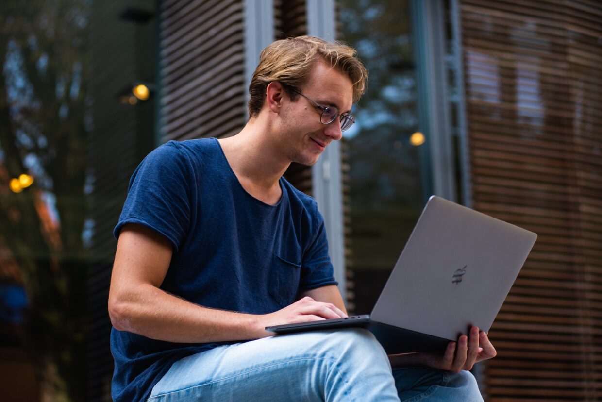 young digital native shopping on a personal laptop