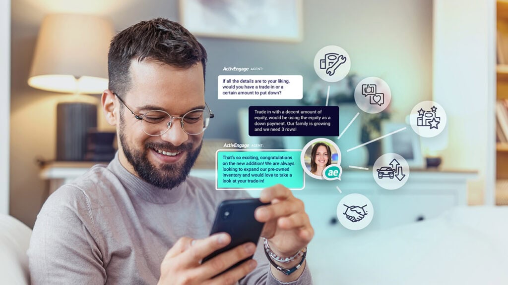 Happy customer texting with a live dealership representative